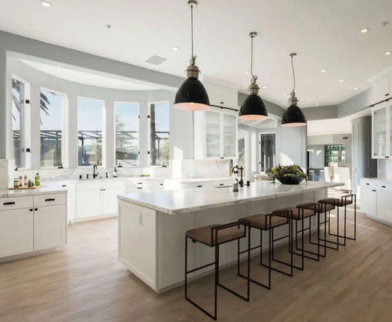 White kitchen with large island