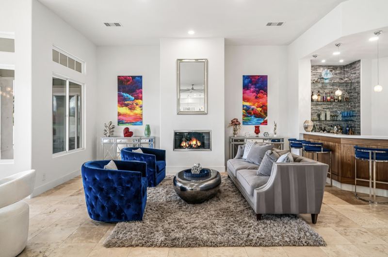 Living room with fireplace and bar
