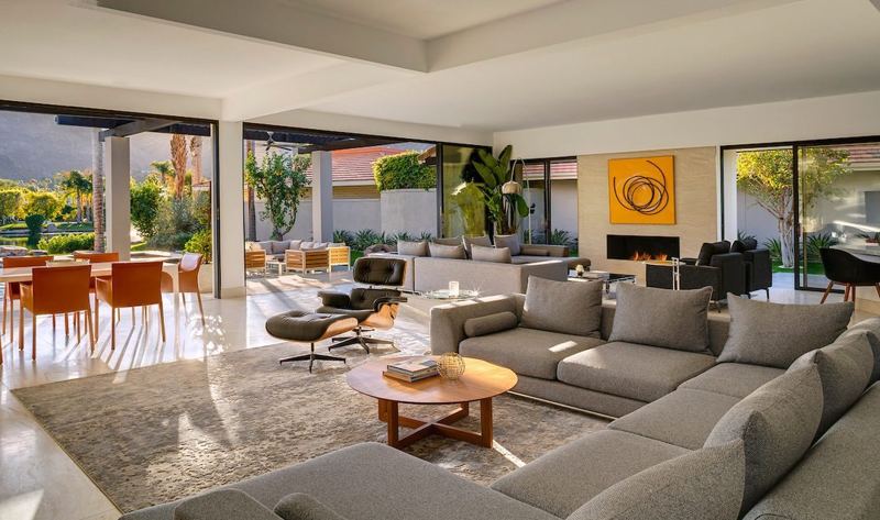 Living room with fireplace and terrace doors