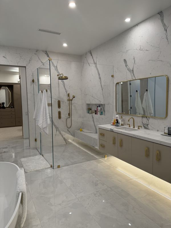 Marble primary bath with glass shower